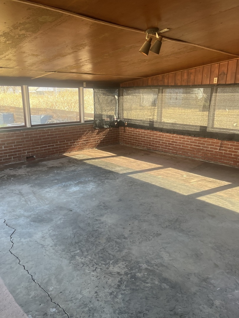 125 West Exchange Street Danvers, IL 61732 - Photo 52 of 66 an empty room with an empty space and windows