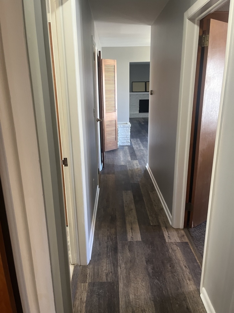 125 West Exchange Street Danvers, IL 61732 - Photo 59 of 66 a view of hallway with wooden floor