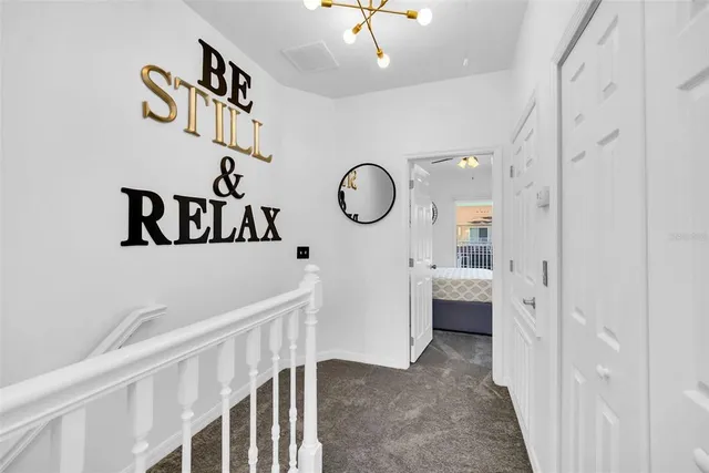 a view of a hallway with entryway