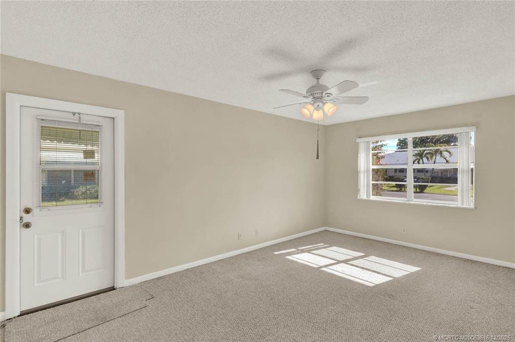 902 Savannas Point Drive, Unit D Fort Pierce, FL 34982 - Photo 13 of 44 a view of empty room with window