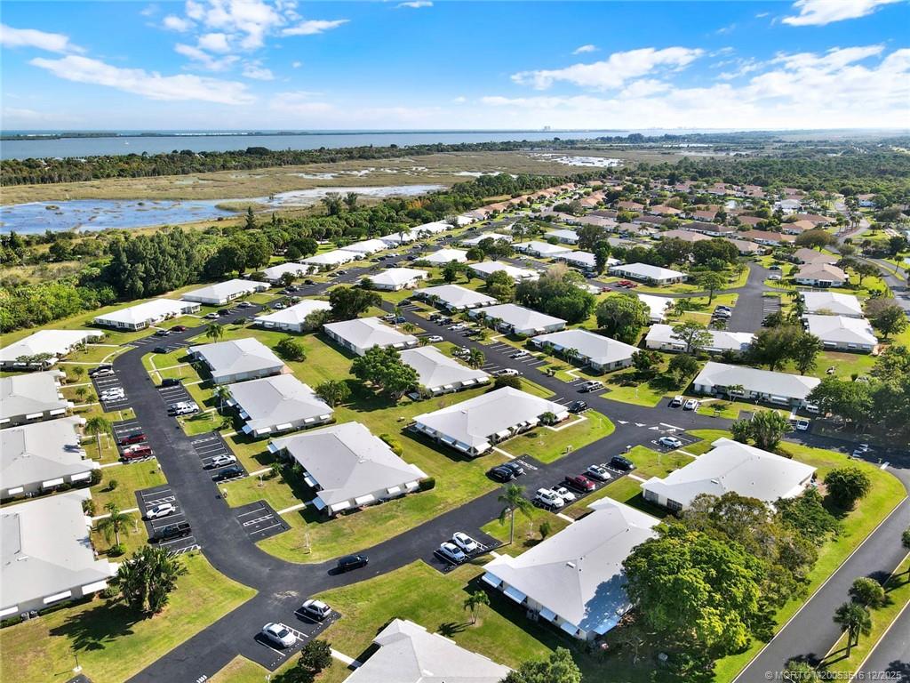 902 Savannas Point Drive, Unit D Fort Pierce, FL 34982 - Photo 39 of 44 an aerial view of residential houses with outdoor space