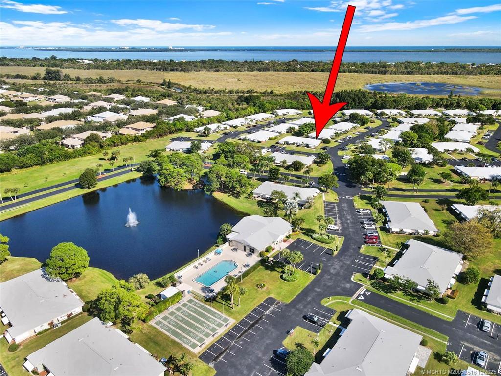 902 Savannas Point Drive, Unit D Fort Pierce, FL 34982 - Photo 40 of 44 a view of a city and an ocean