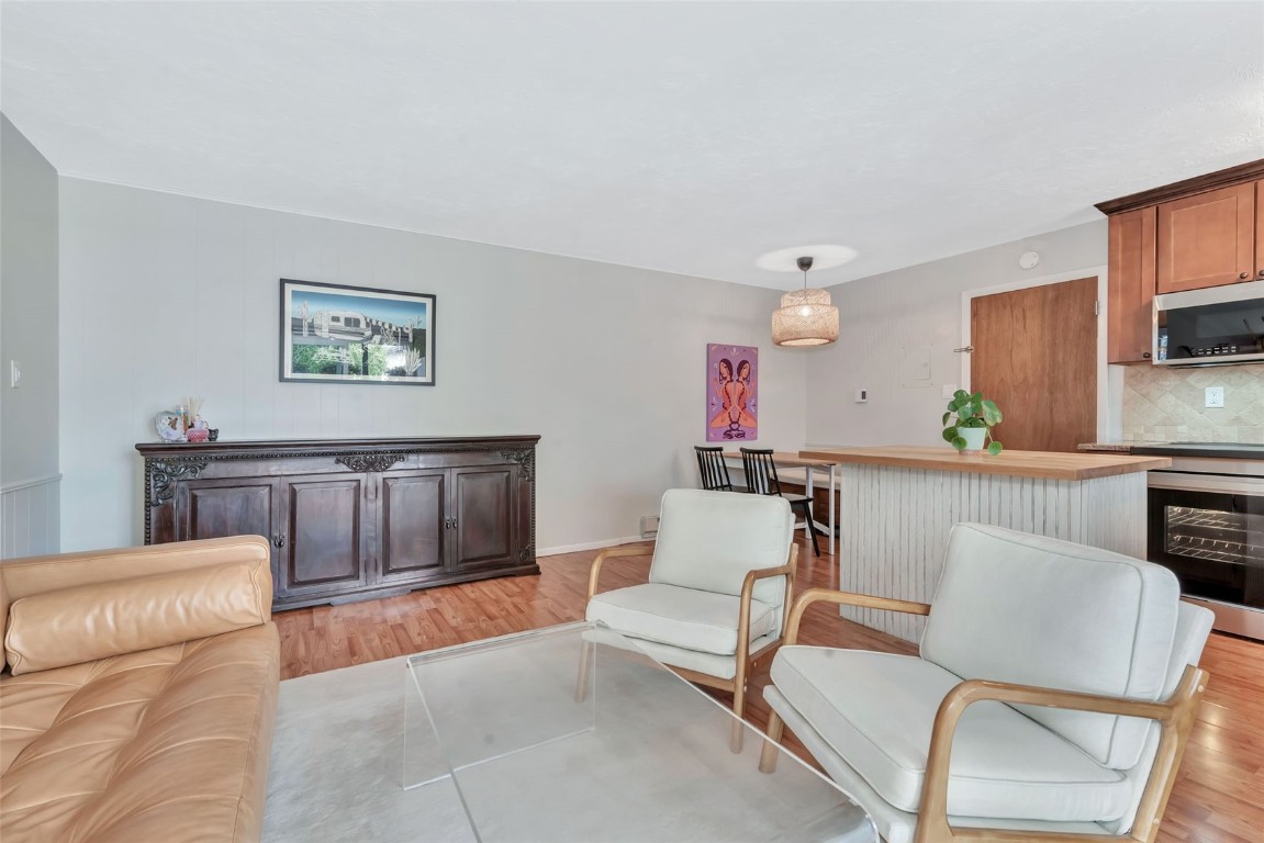 259 6th Street, Unit 8 Steamboat Springs, CO 80487 - Photo 13 of 33 a living room with furniture and a flat screen tv