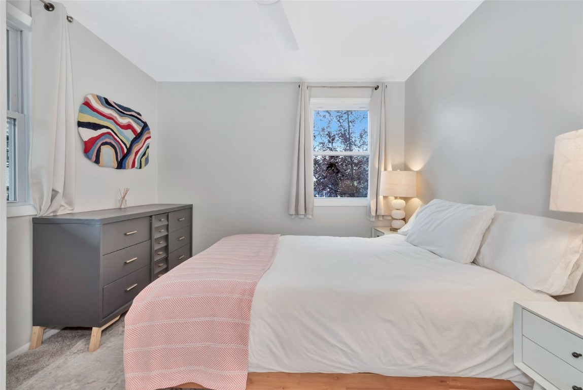 259 6th Street, Unit 8 Steamboat Springs, CO 80487 - Photo 16 of 33 a bedroom with a bed and a window