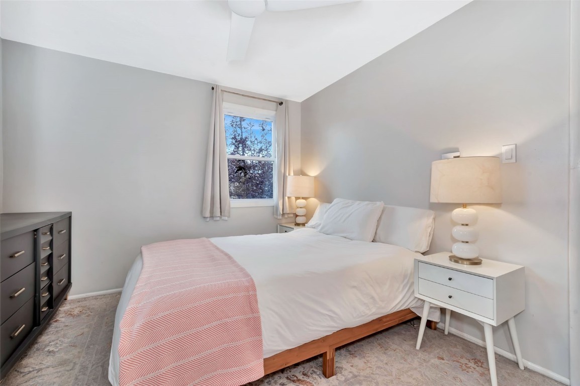 259 6th Street, Unit 8 Steamboat Springs, CO 80487 - Photo 17 of 33 a bedroom with a bed and a window