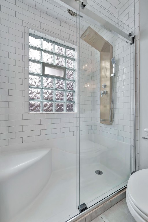 259 6th Street, Unit 8 Steamboat Springs, CO 80487 - Photo 20 of 33 a bathroom with a shower and a bathtub