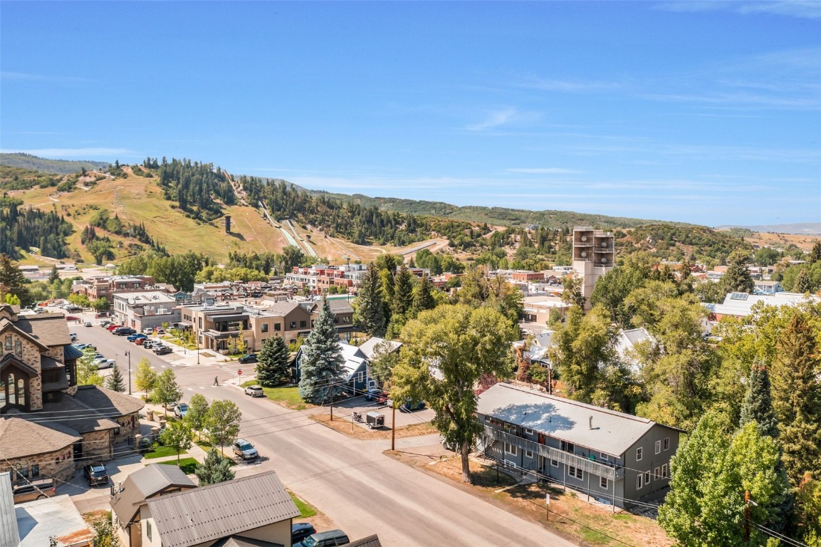 259 6th Street, Unit 8 Steamboat Springs, CO 80487 - Photo 31 of 33 an aerial view of residential houses with outdoor space