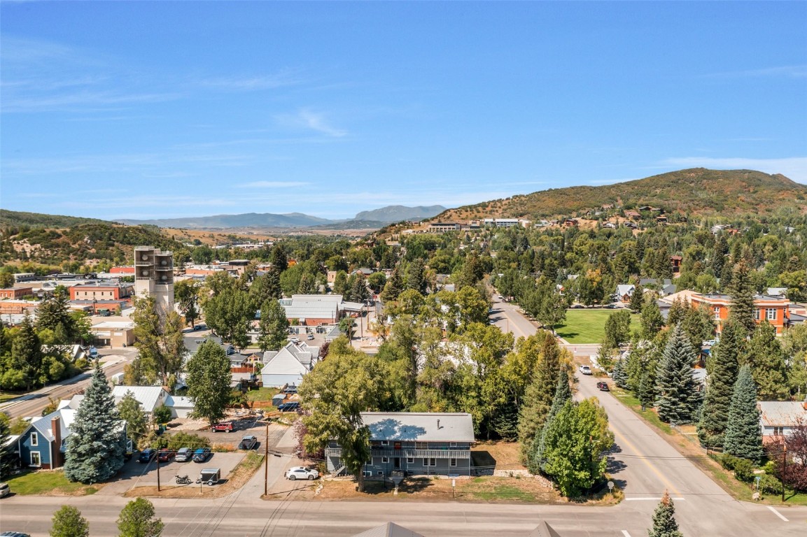 259 6th Street, Unit 8 Steamboat Springs, CO 80487 - Photo 32 of 33 an aerial view of residential houses with outdoor space and trees