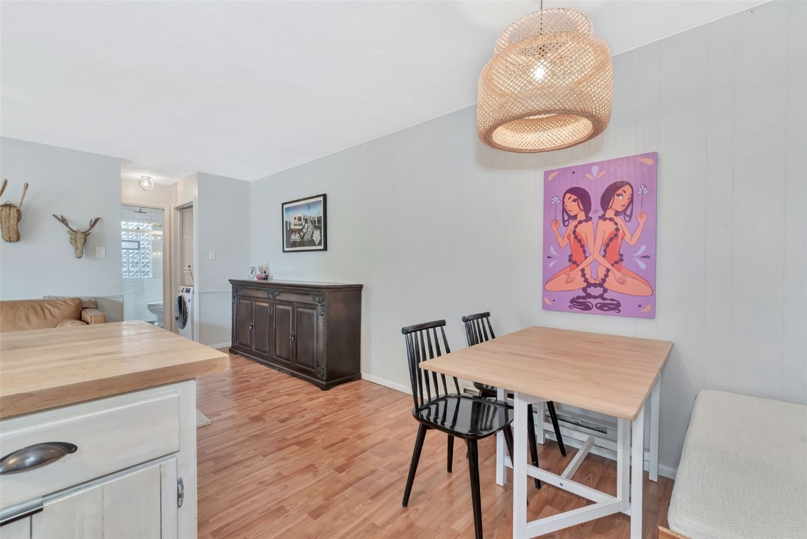 259 6th Street, Unit 8 Steamboat Springs, CO 80487 - Photo 5 of 33 a view of a dining room with furniture and wooden floor