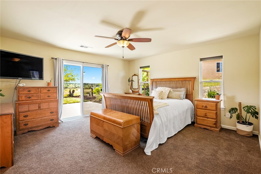 5950 Forked Horn Place Paso Robles, CA 93446 - Photo 16 of 31 a bed room with a bed and a television