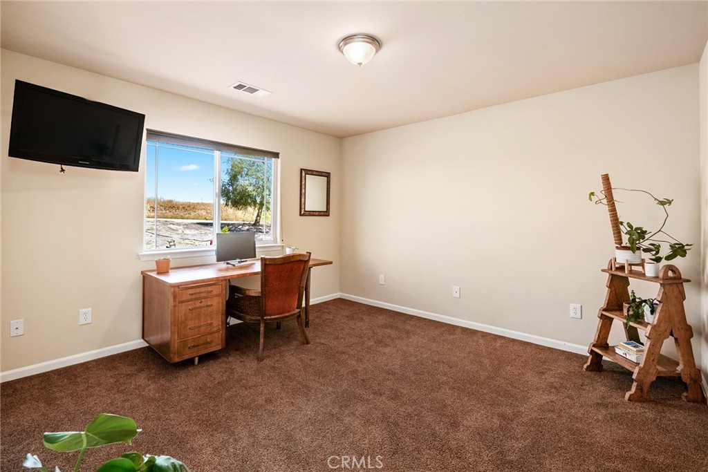 5950 Forked Horn Place Paso Robles, CA 93446 - Photo 21 of 31 a view of a room with furniture and a window