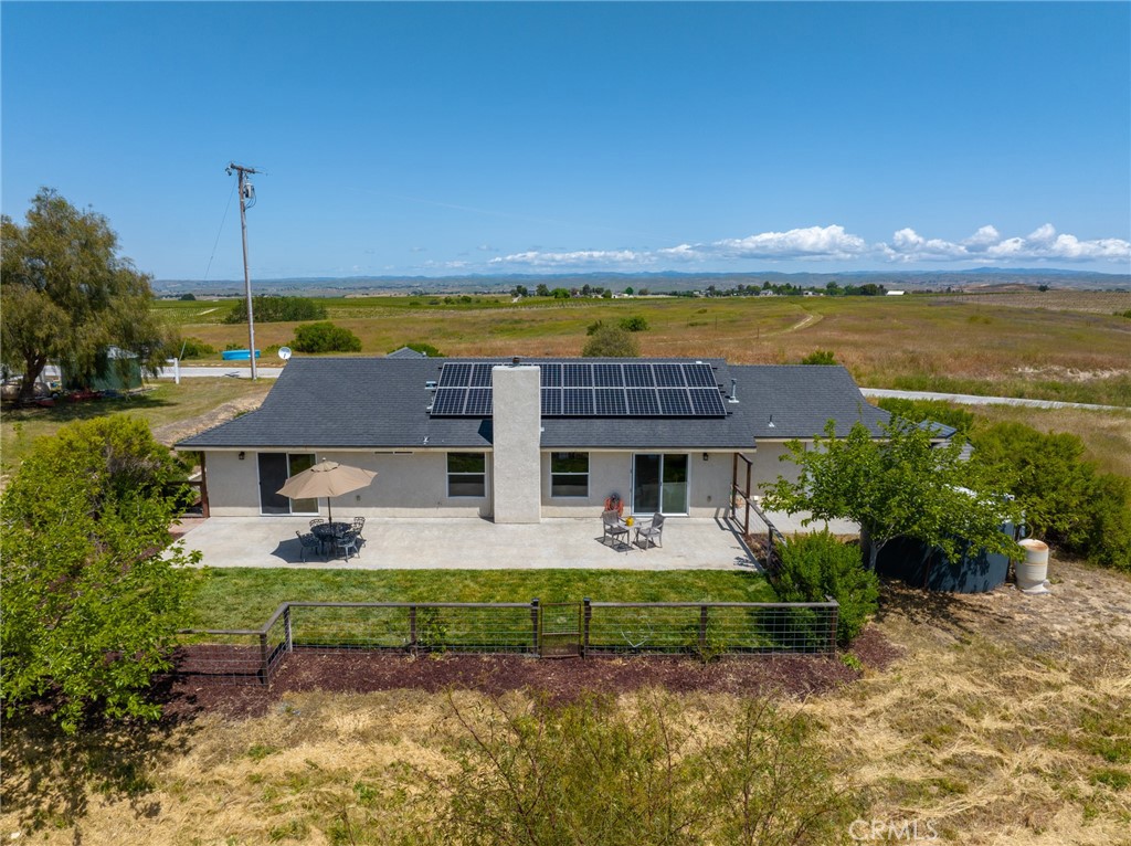 5950 Forked Horn Place Paso Robles, CA 93446 - Photo 29 of 31 a front view of a house with garden and patio