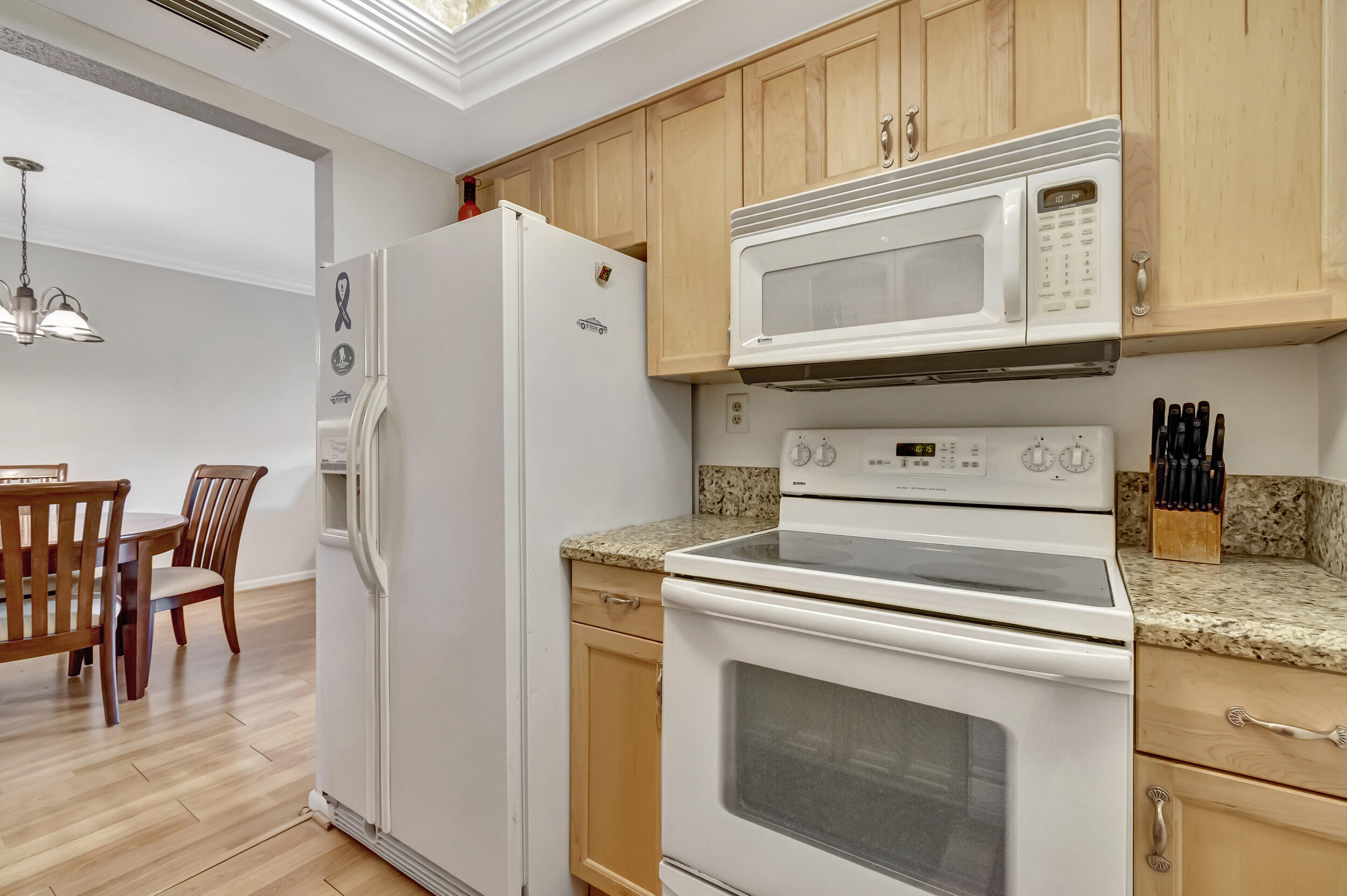 5540 North Ocean Boulevard, Unit 204 Ocean Ridge, FL 33435 - Photo 16 of 52 a utility room with dryer and washer