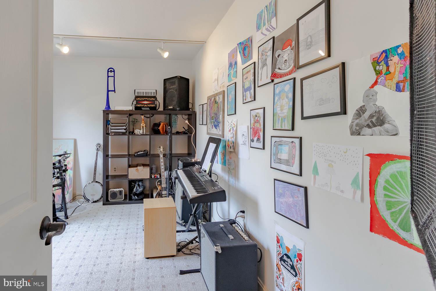 115 Heiskel Drive Port Matilda, PA 16870 - Photo 15 of 66 Creative space filled with vibrant art.