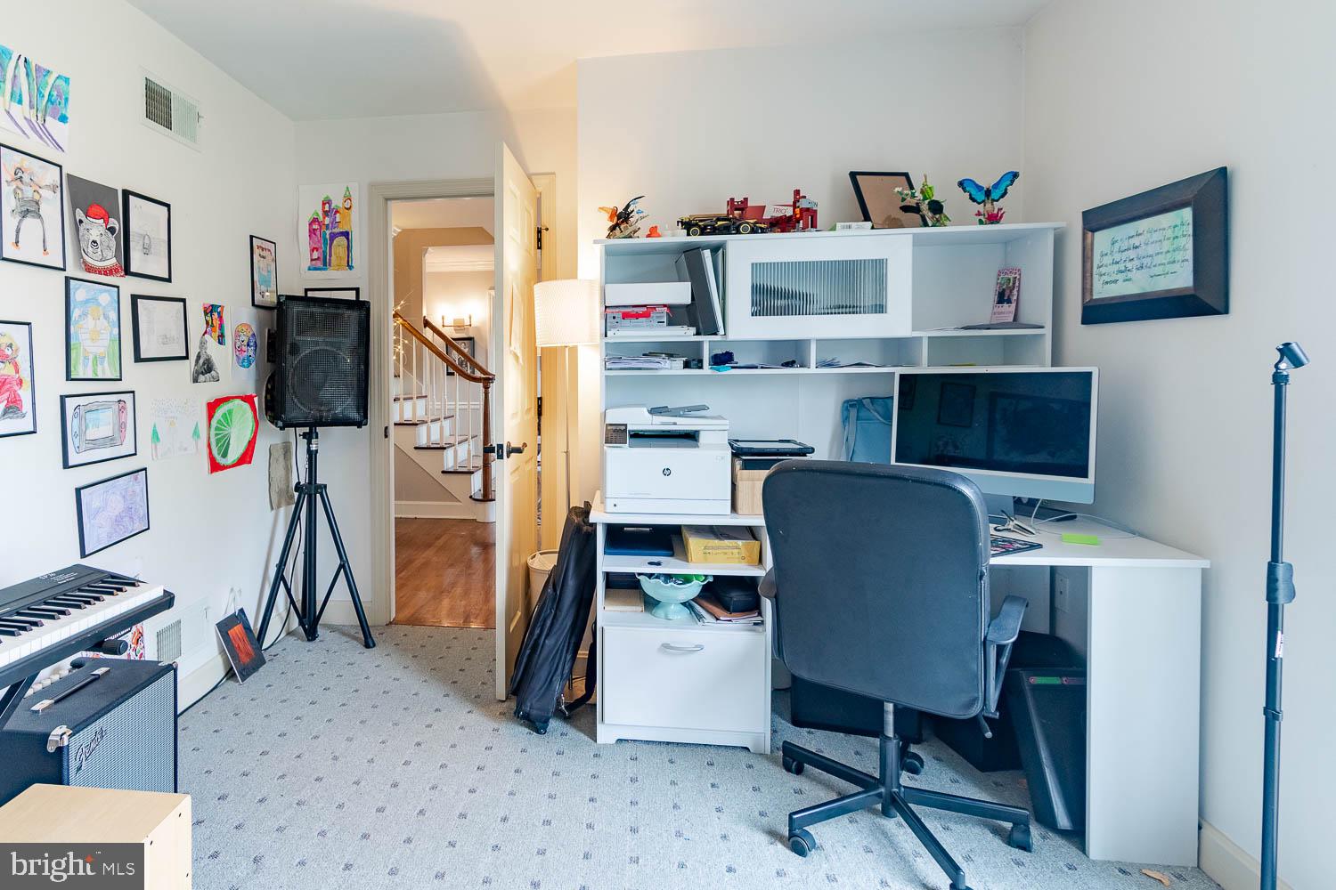 115 Heiskel Drive Port Matilda, PA 16870 - Photo 17 of 66 Creative workspace with vibrant decor.