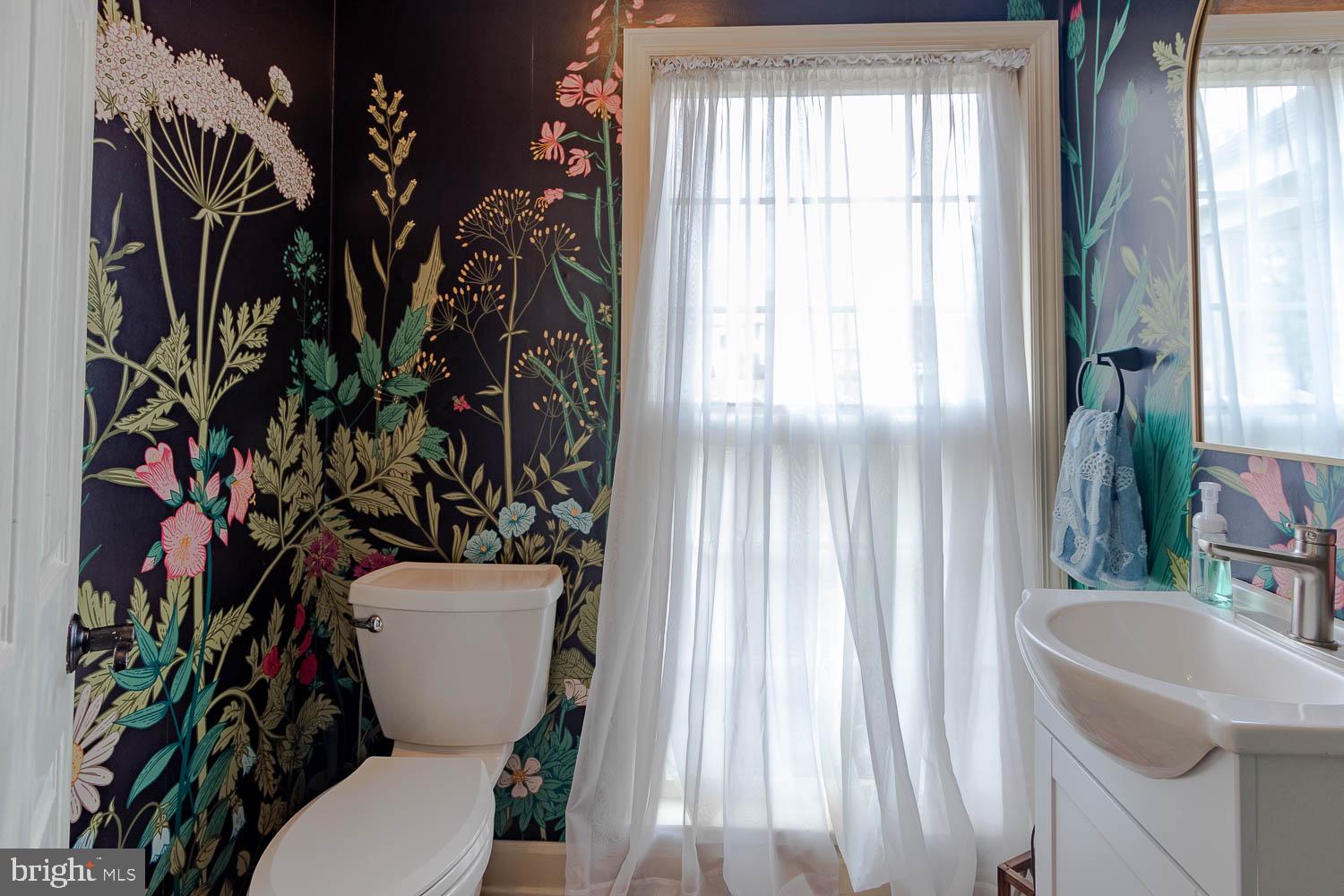 115 Heiskel Drive Port Matilda, PA 16870 - Photo 18 of 66 Floral elegance in a serene bathroom.