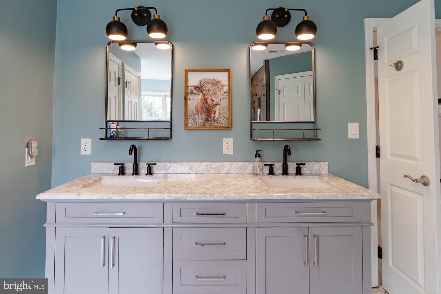 115 Heiskel Drive Port Matilda, PA 16870 - Photo 46 of 66 Elegant dual-sink bathroom retreat.