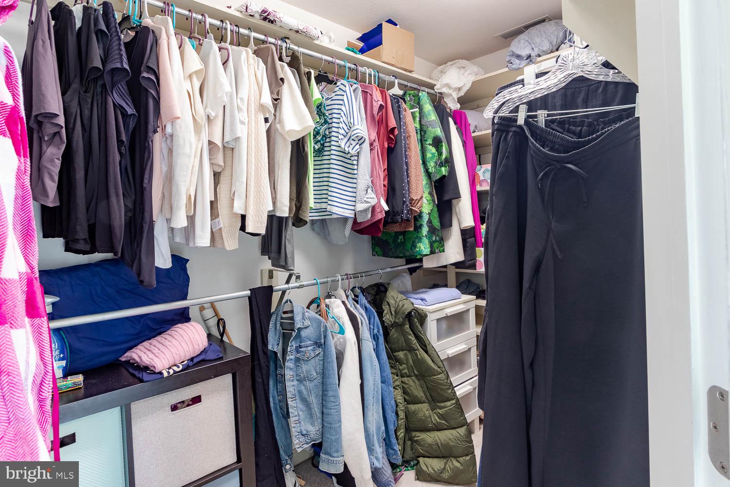 115 Heiskel Drive Port Matilda, PA 16870 - Photo 48 of 66 Organized closet with vibrant attire.