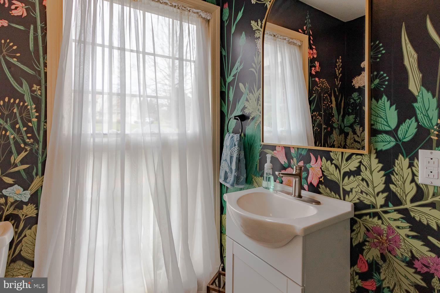 115 Heiskel Drive Port Matilda, PA 16870 - Photo 5 of 66 Floral elegance in a bright bathroom.