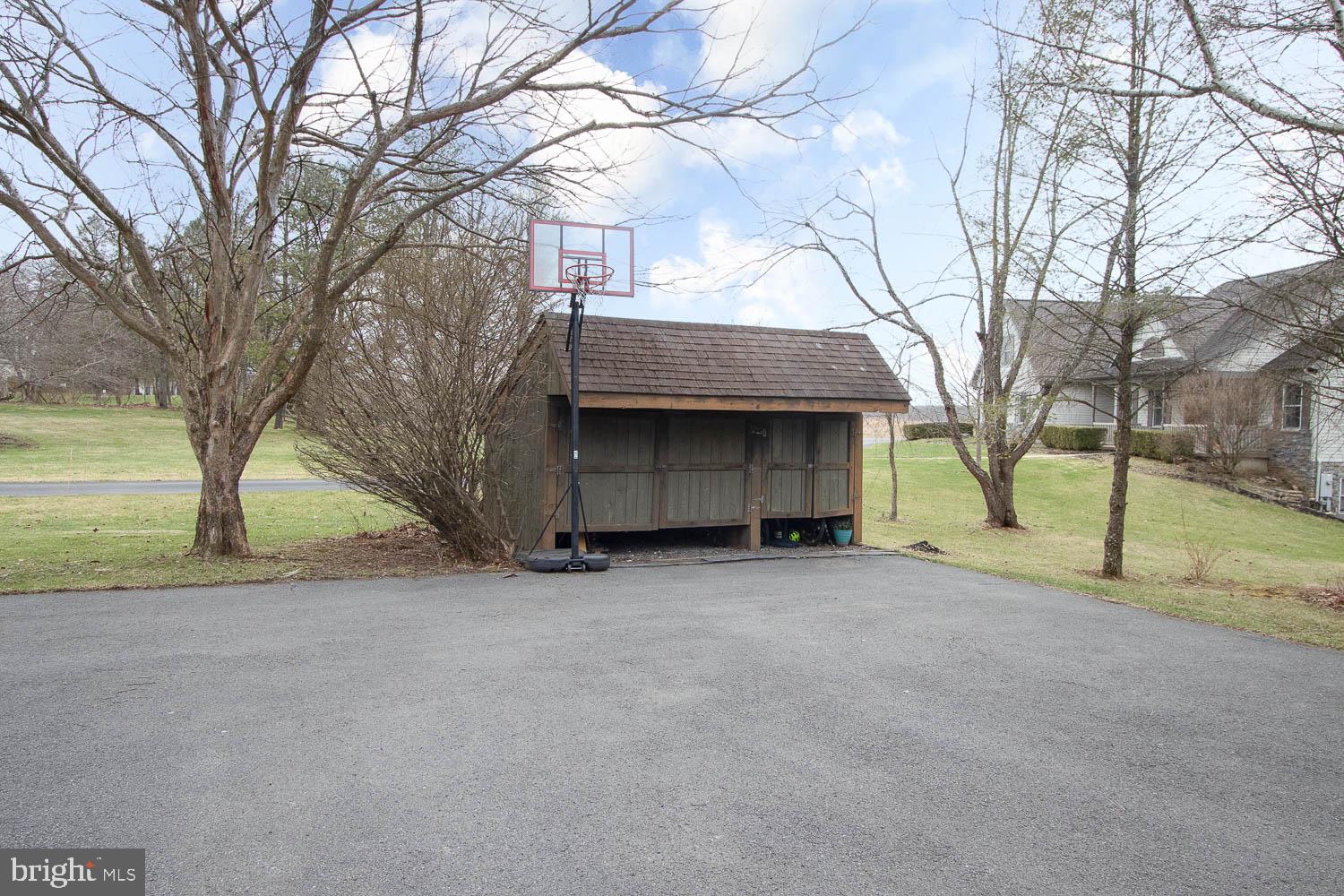 115 Heiskel Drive Port Matilda, PA 16870 - Photo 8 of 66 Spacious yard with basketball hoop.