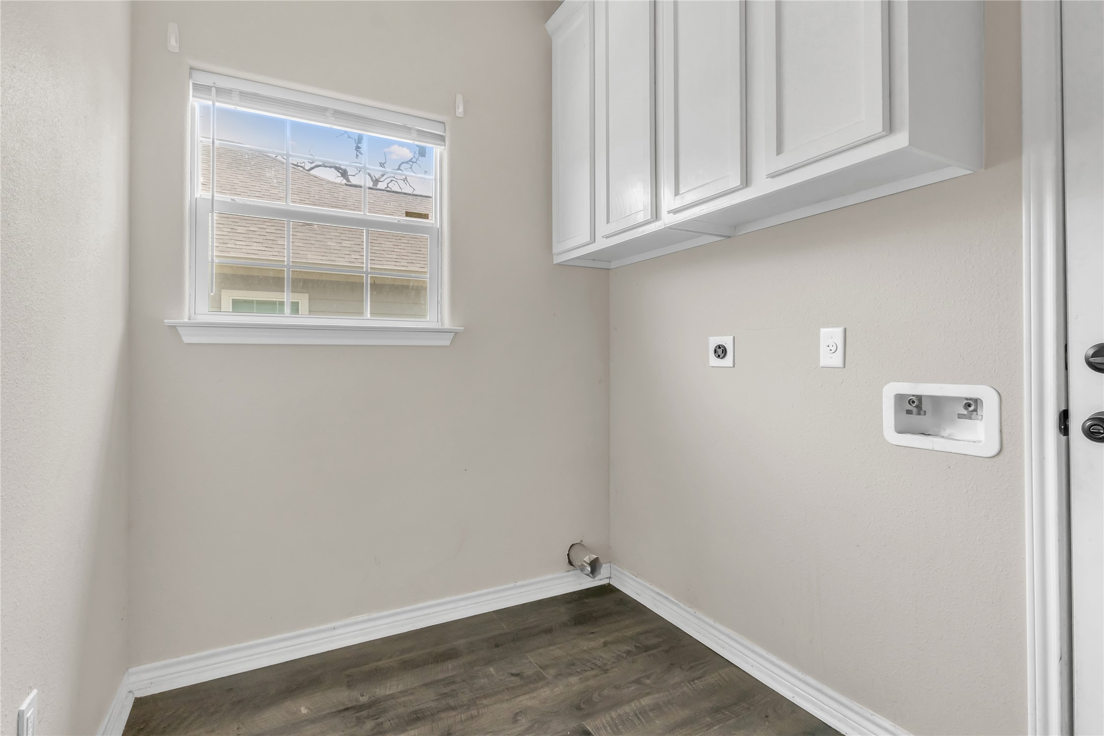 904 New York Street Bryan, TX 77803 - Photo 7 of 11 a view of empty room with wooden floor