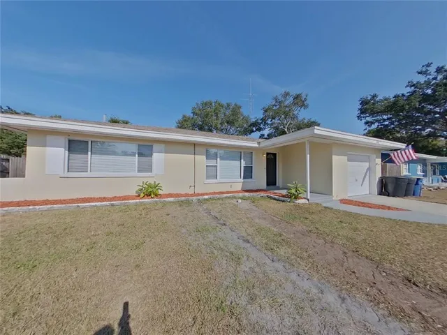front view of a house with a patio