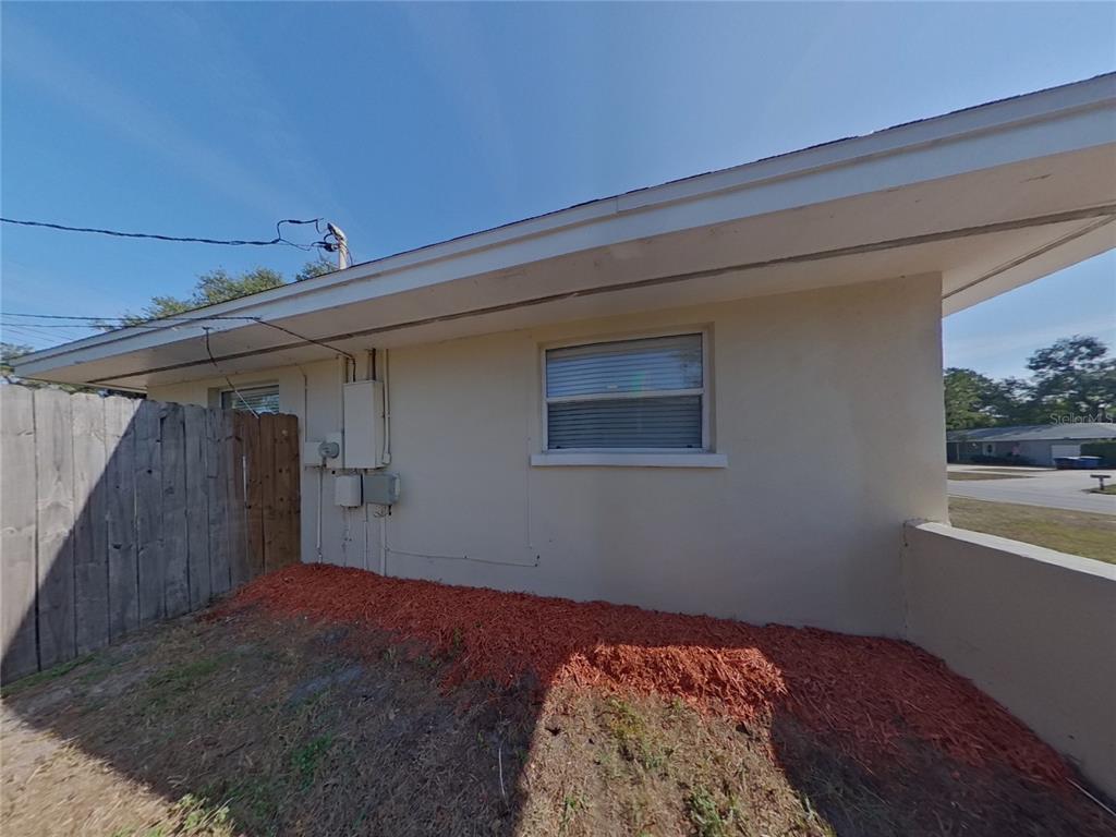 Undisclosed Address Clearwater, FL 33755 - Photo 21 of 22 a bedroom with a bed and a window