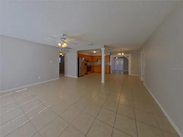 a view of a livingroom with a staircase