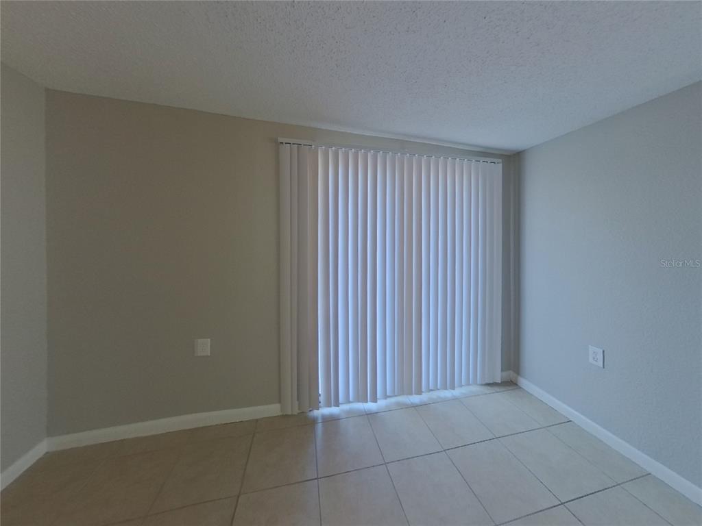 Undisclosed Address Clearwater, FL 33755 - Photo 6 of 22 an empty room with an entryway