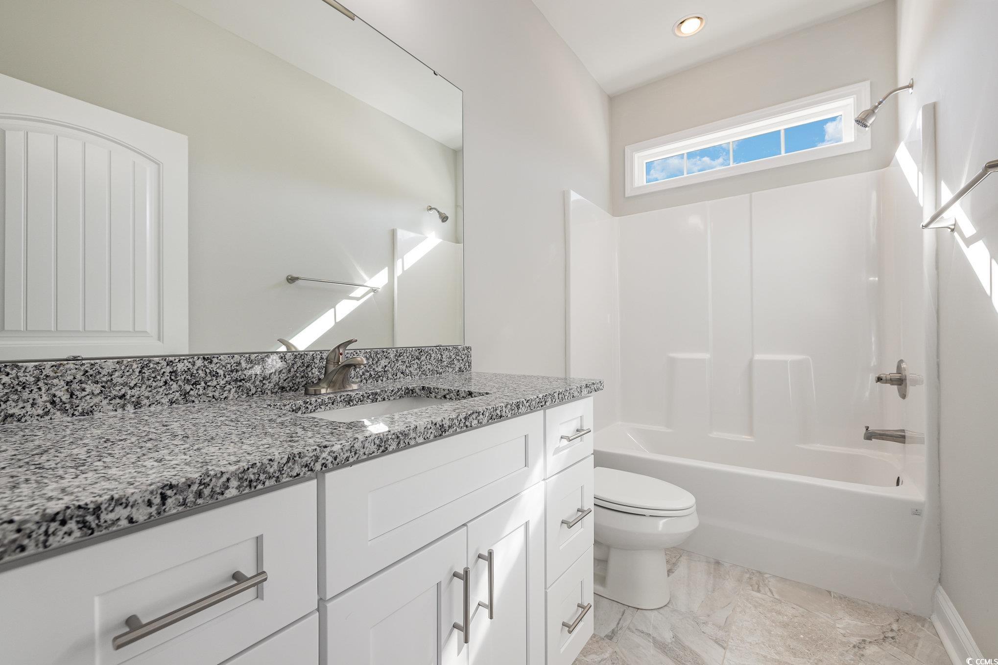 369 Log Cabin Road Loris, SC 29569 - Photo 25 of 30 Full bathroom featuring vanity, shower / bathing t