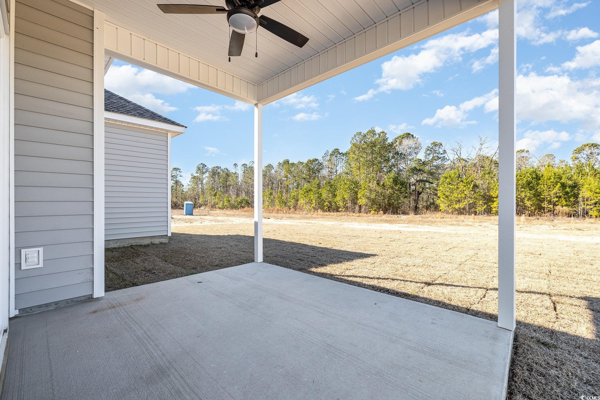 369 Log Cabin Road Loris, SC 29569 - Photo 27 of 30 View of patio with ceiling fan