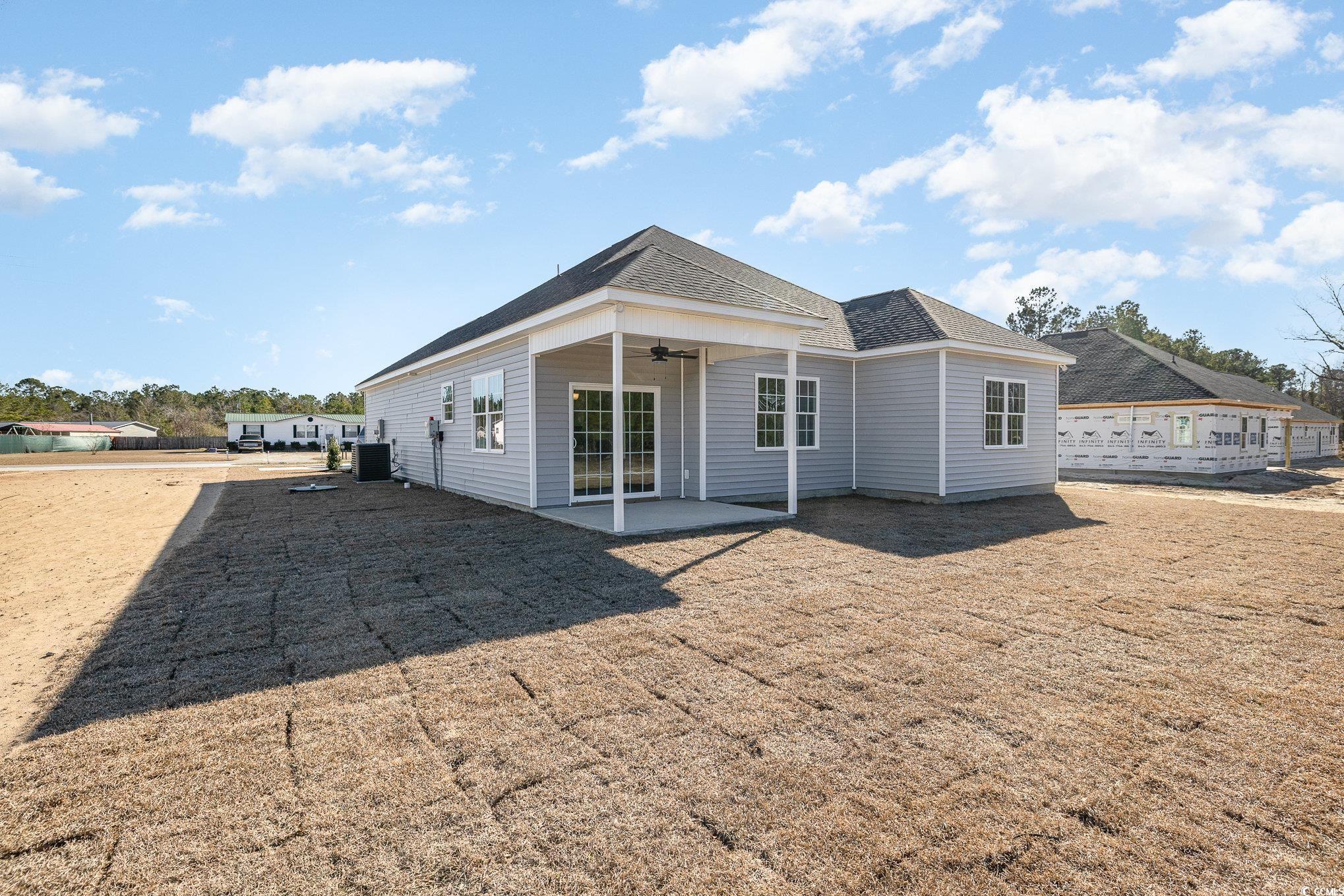 369 Log Cabin Road Loris, SC 29569 - Photo 28 of 30 Back of property featuring ceiling fan, a patio, a