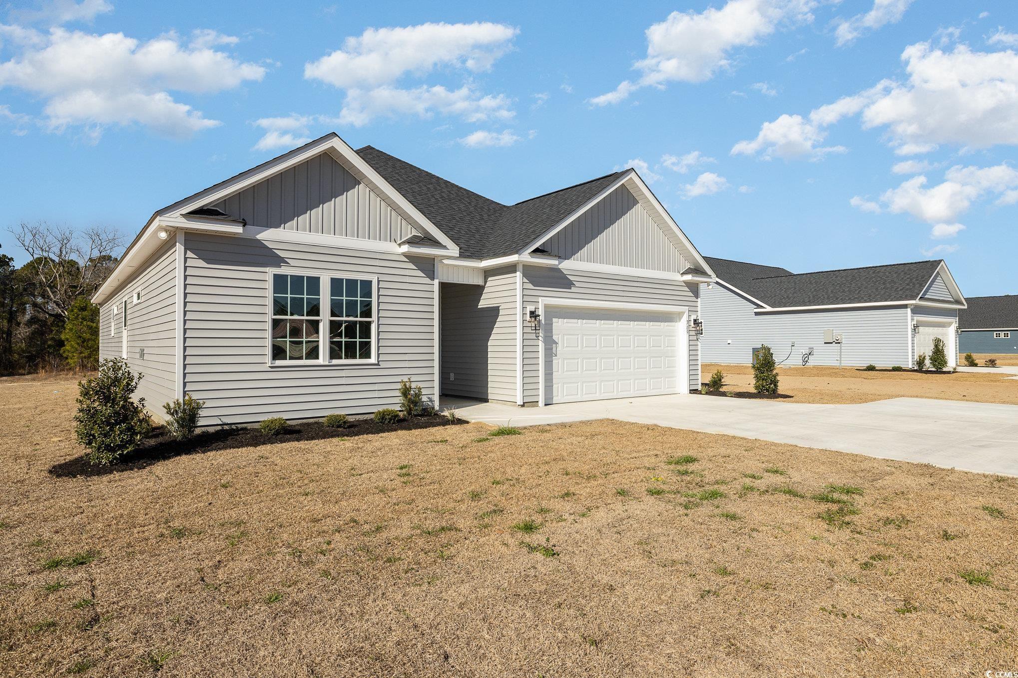 369 Log Cabin Road Loris, SC 29569 - Photo 3 of 30 View of front facade featuring a front lawn and a