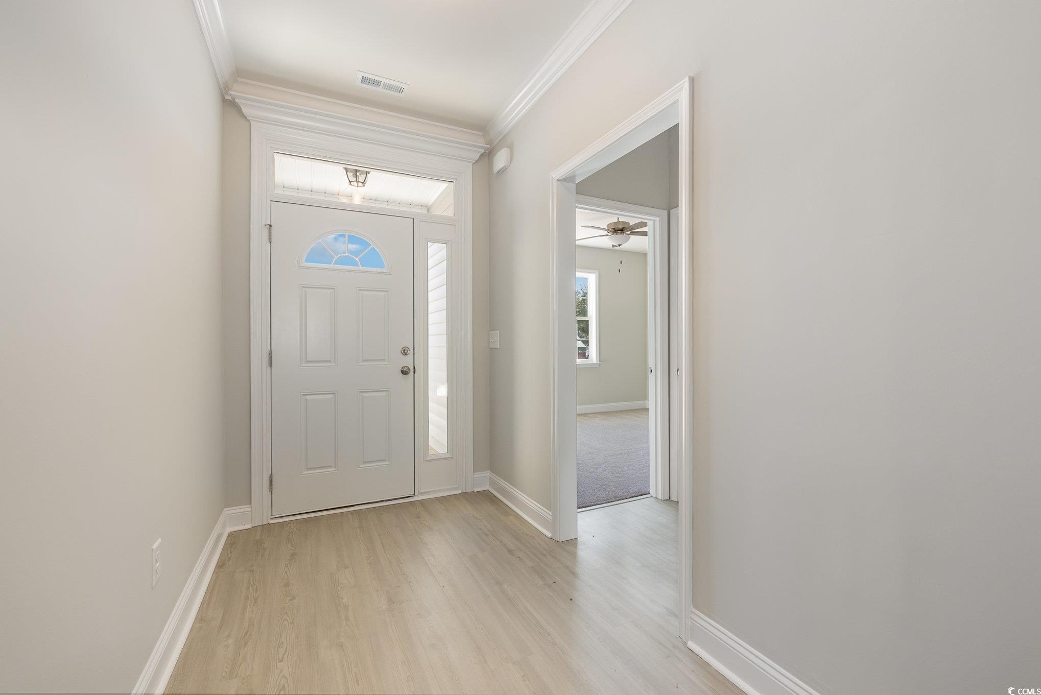 369 Log Cabin Road Loris, SC 29569 - Photo 5 of 30 Entrance foyer with light wood-type flooring and o