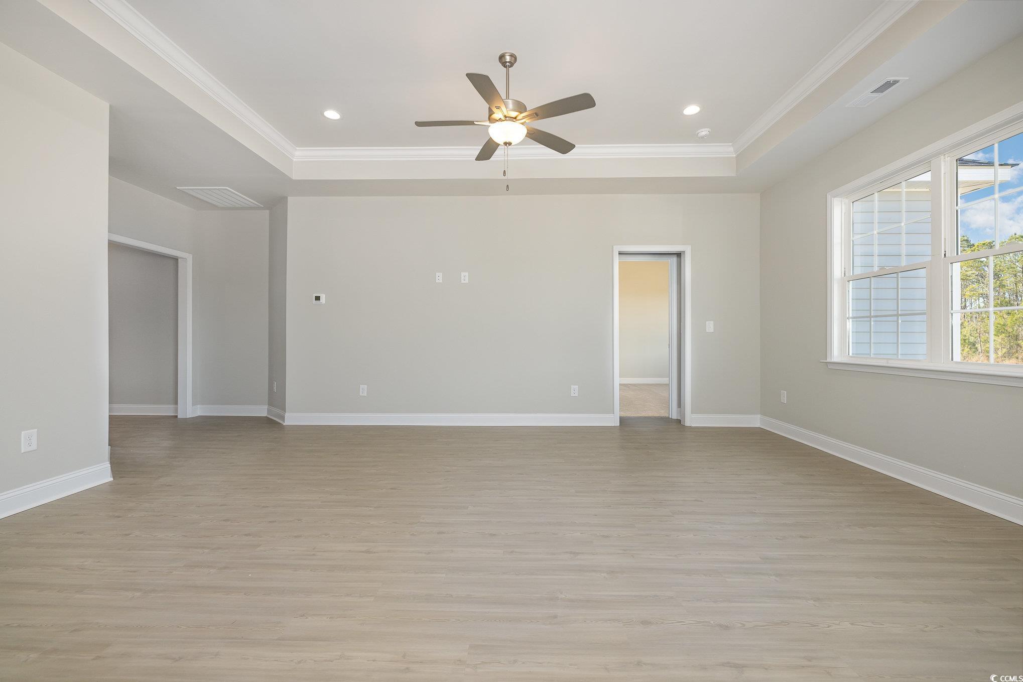 369 Log Cabin Road Loris, SC 29569 - Photo 6 of 30 Unfurnished room with a raised ceiling, ceiling fa