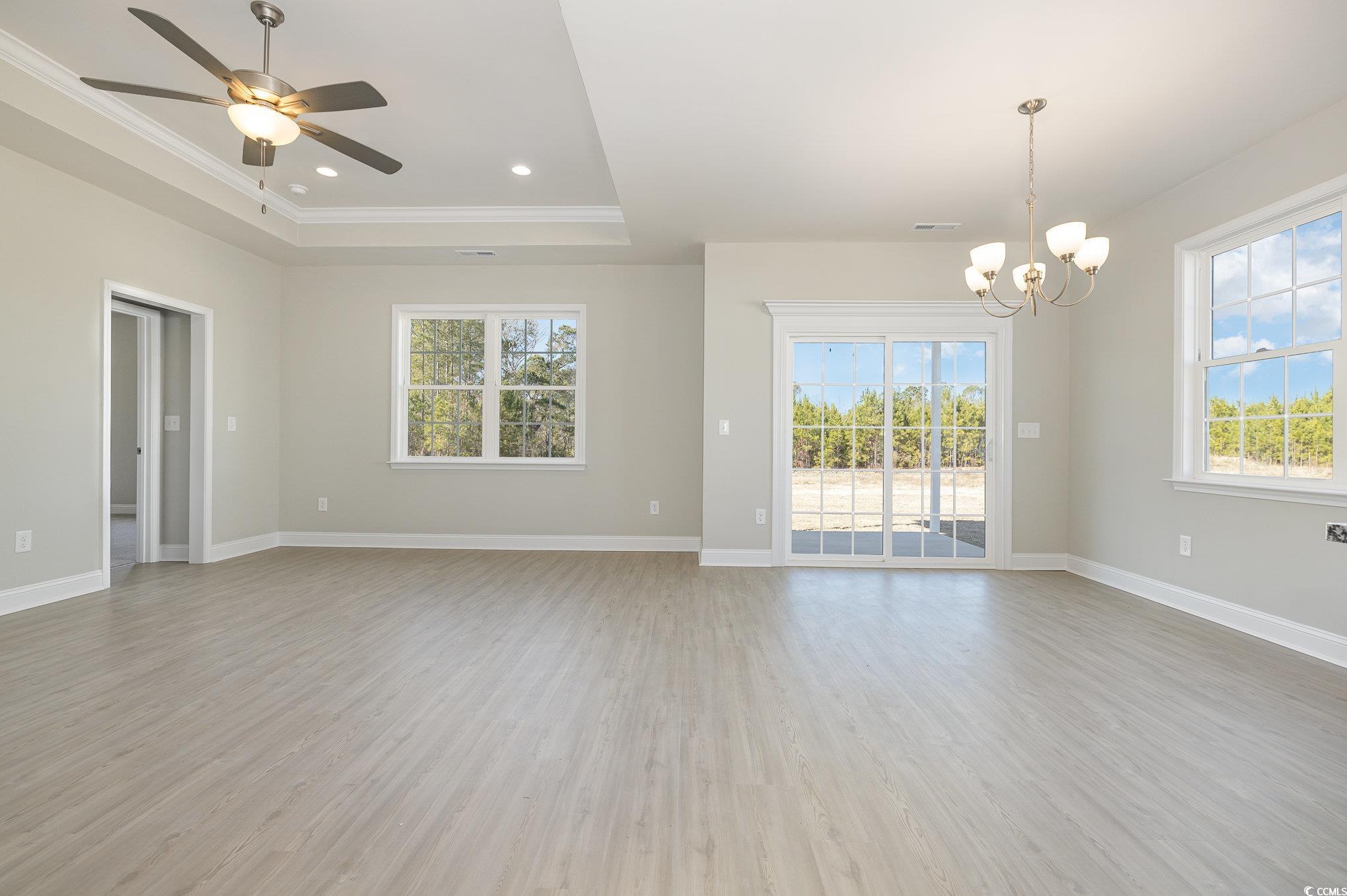369 Log Cabin Road Loris, SC 29569 - Photo 7 of 30 Unfurnished room featuring hardwood / wood-style f