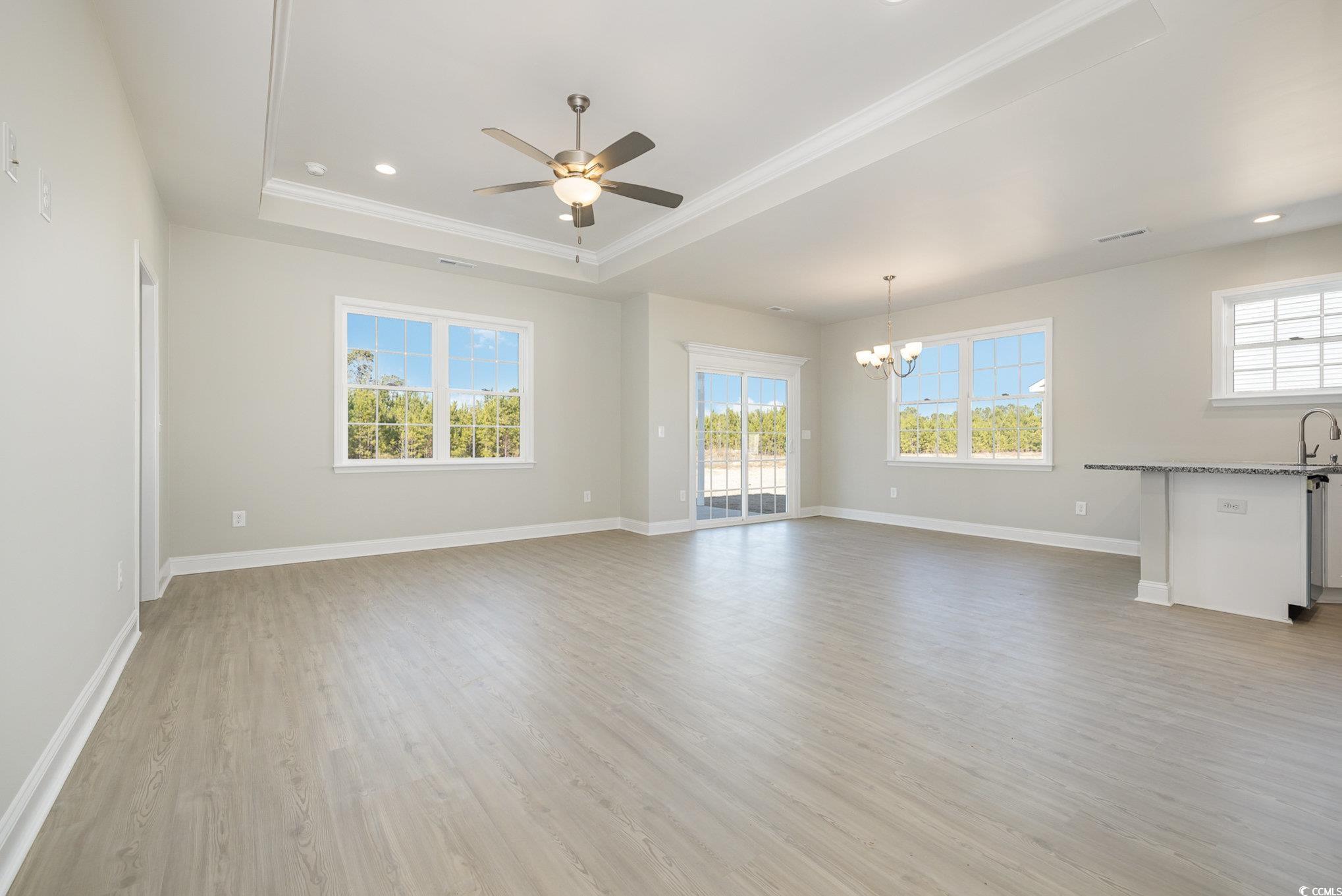369 Log Cabin Road Loris, SC 29569 - Photo 9 of 30 Unfurnished living room with ornamental molding, c