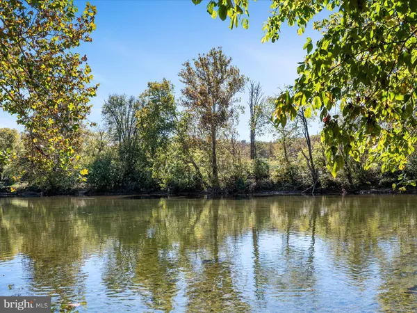 a view of a lake with a outdoor space
