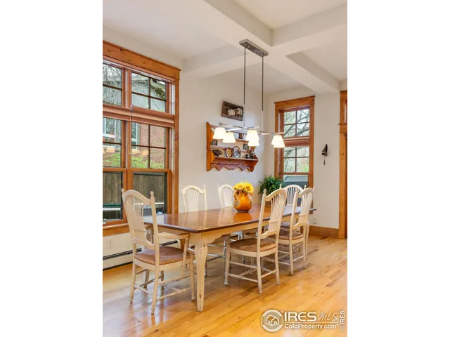 a open kitchen with stainless steel appliances granite countertop a stove and a wooden cabinets