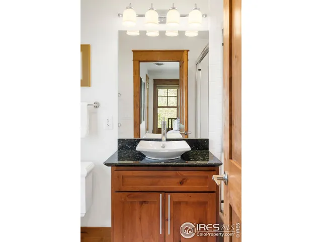 a patio with a patio table and chairs