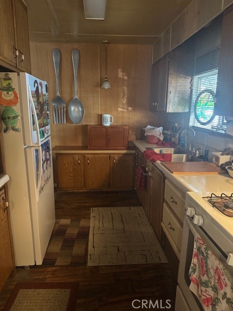 10550 Western Avenue, Unit 3 Stanton, CA 90680 - Photo 7 of 7 a kitchen with a sink and wooden cabinets