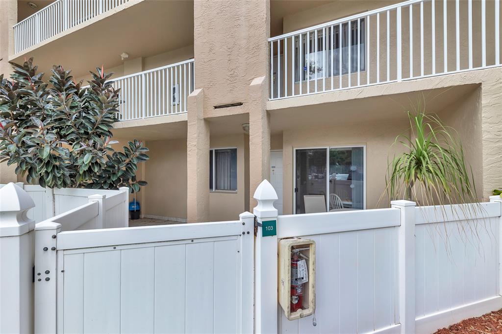 9599 Weldon Circle, Unit 103A Tamarac, FL 33321 - Photo 10 of 26 a house view with a outdoor space