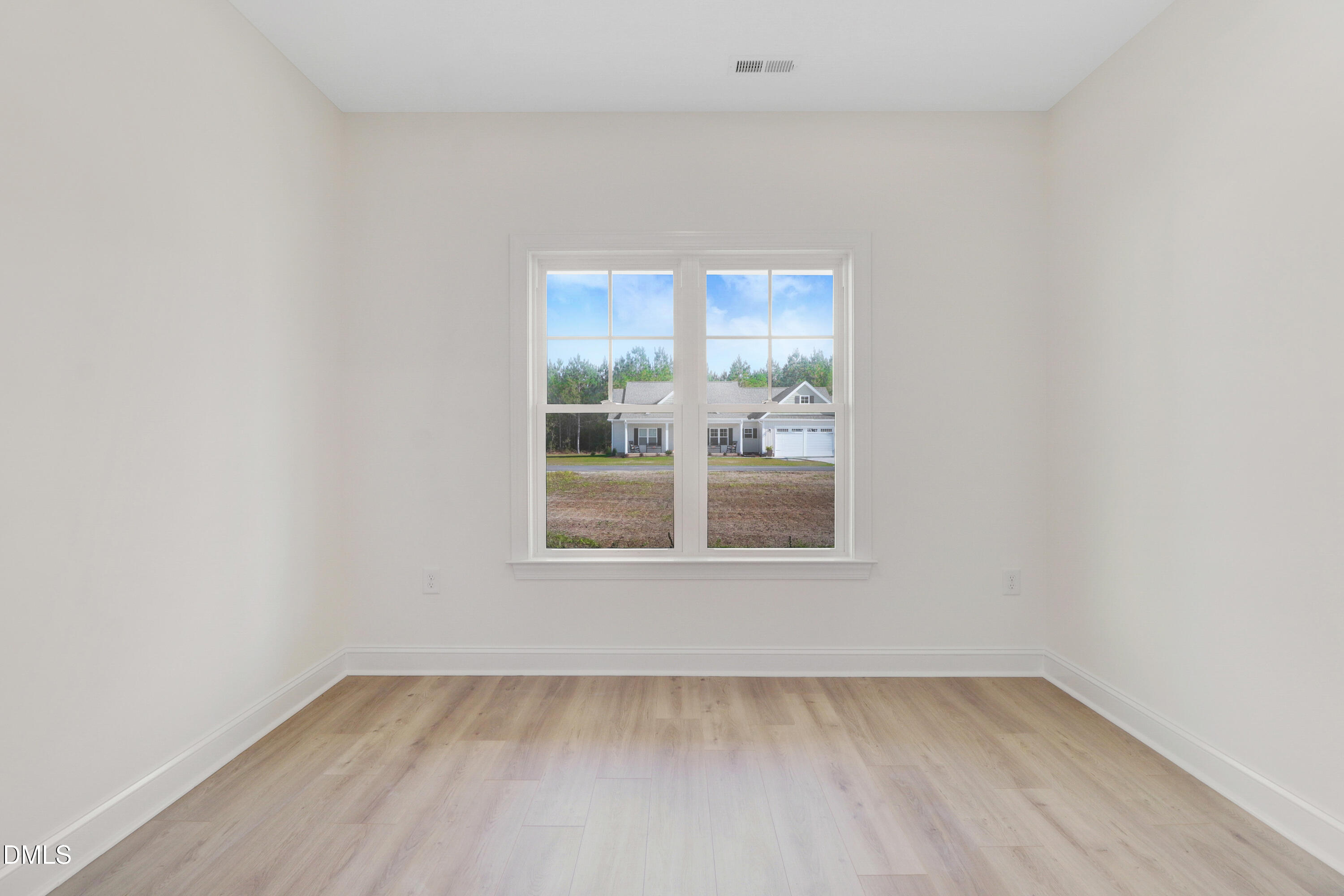 110 Rae Drive Pikeville, NC 27863 - Photo 31 of 35 a view of an empty room with a window
