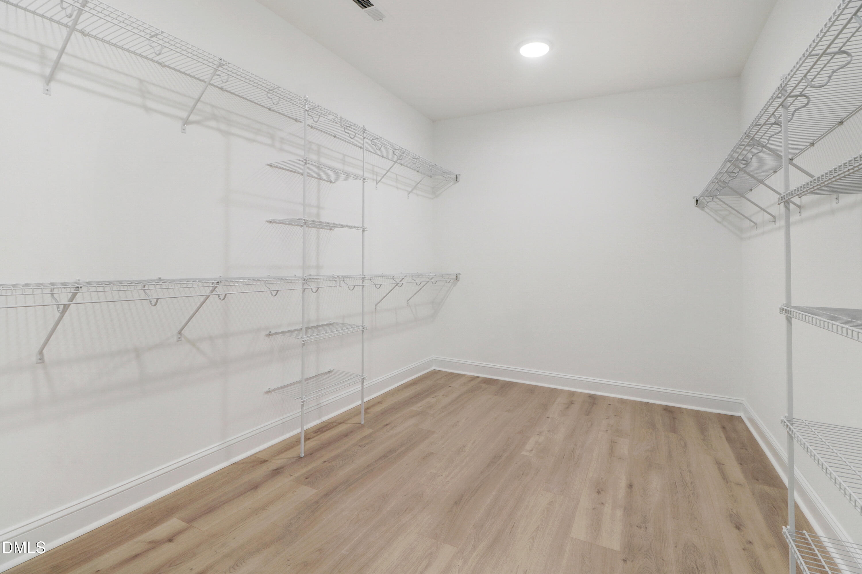 110 Rae Drive Pikeville, NC 27863 - Photo 35 of 35 a view of a room with racks on the wall