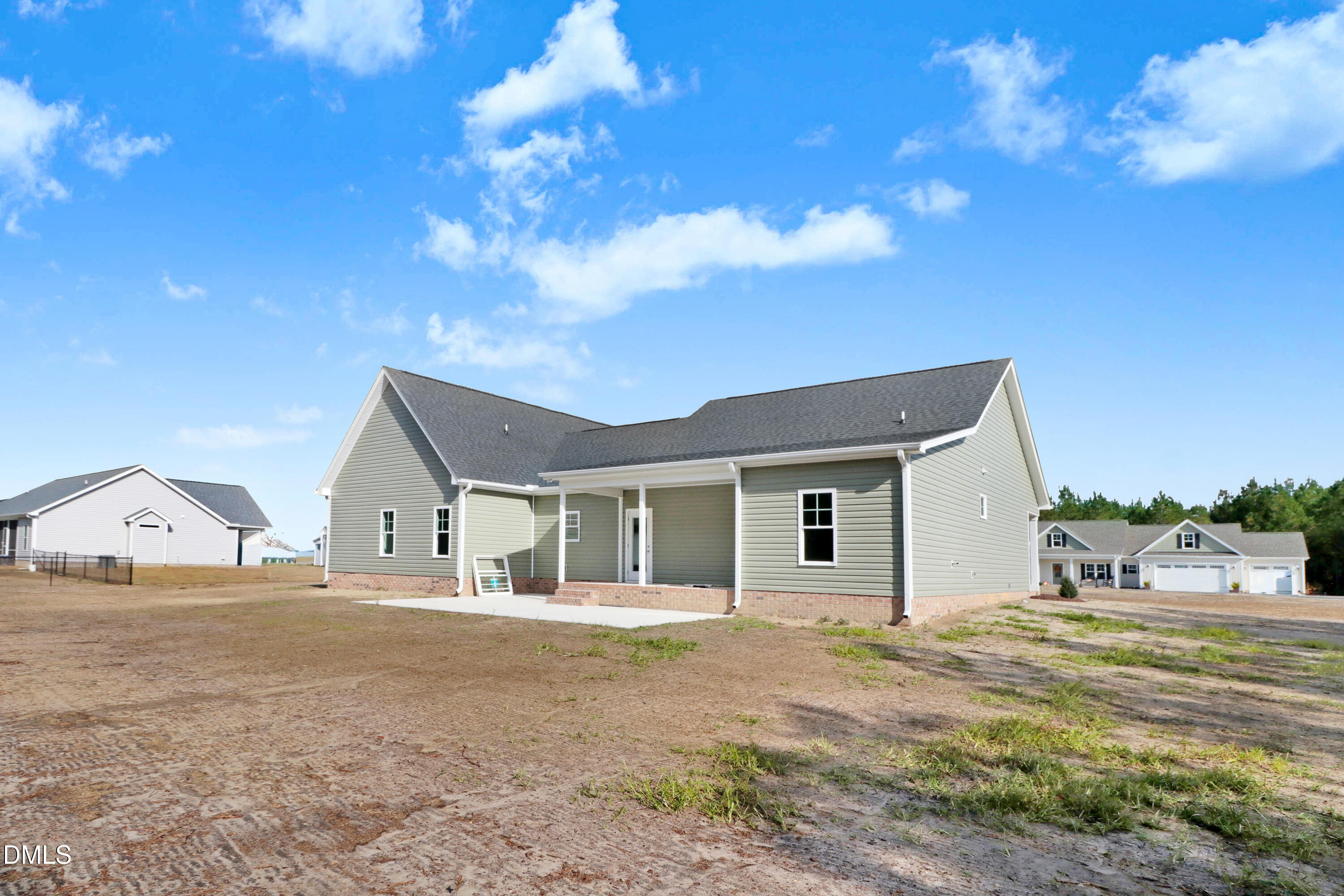 110 Rae Drive Pikeville, NC 27863 - Photo 5 of 35 a house view with a garden space
