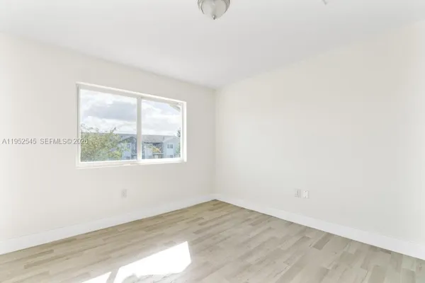 an empty room with a window