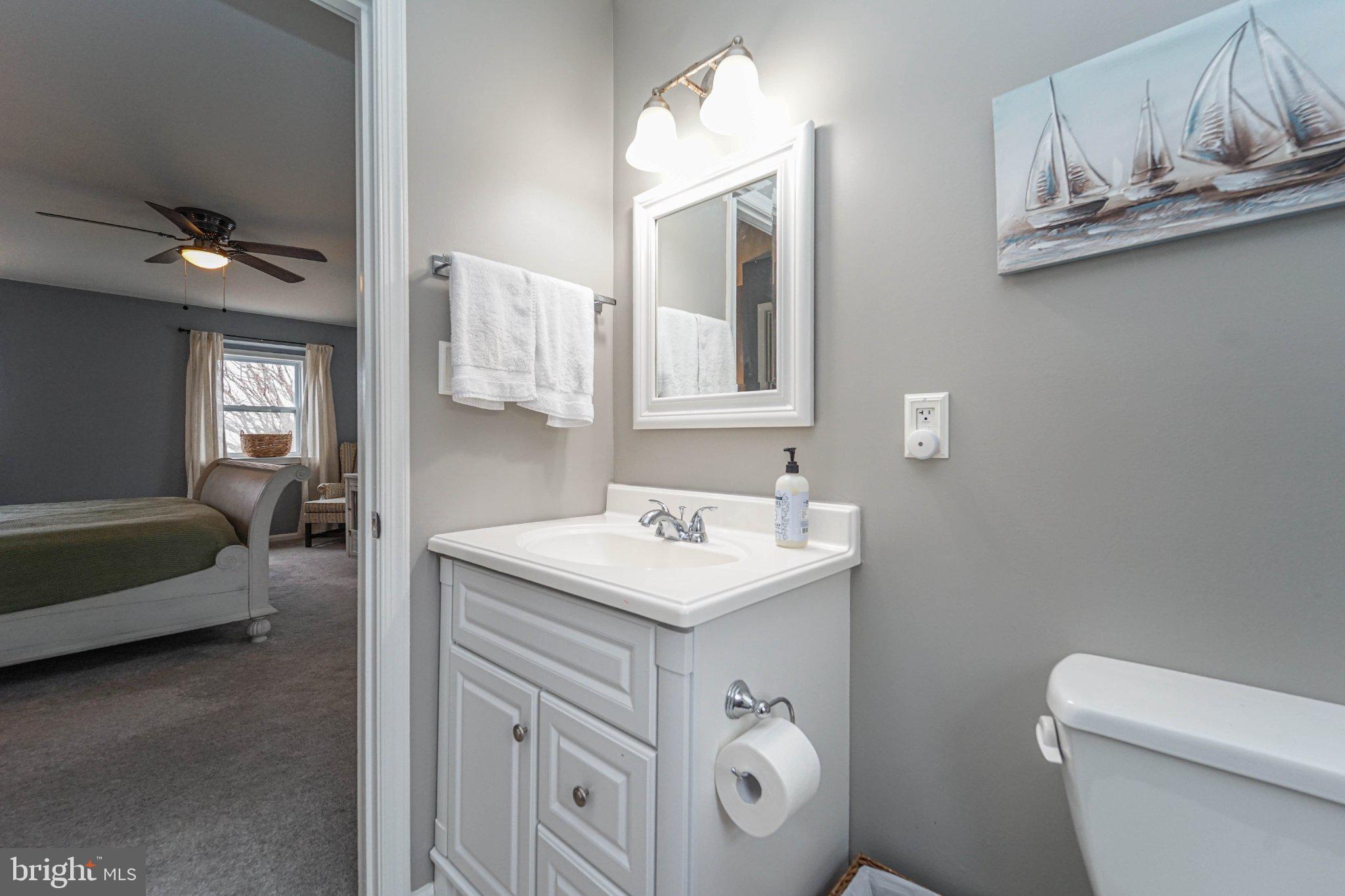 211 Queen Anne Road Stevensville, MD 21666 - Photo 32 of 33 Charming bathroom with modern touches.