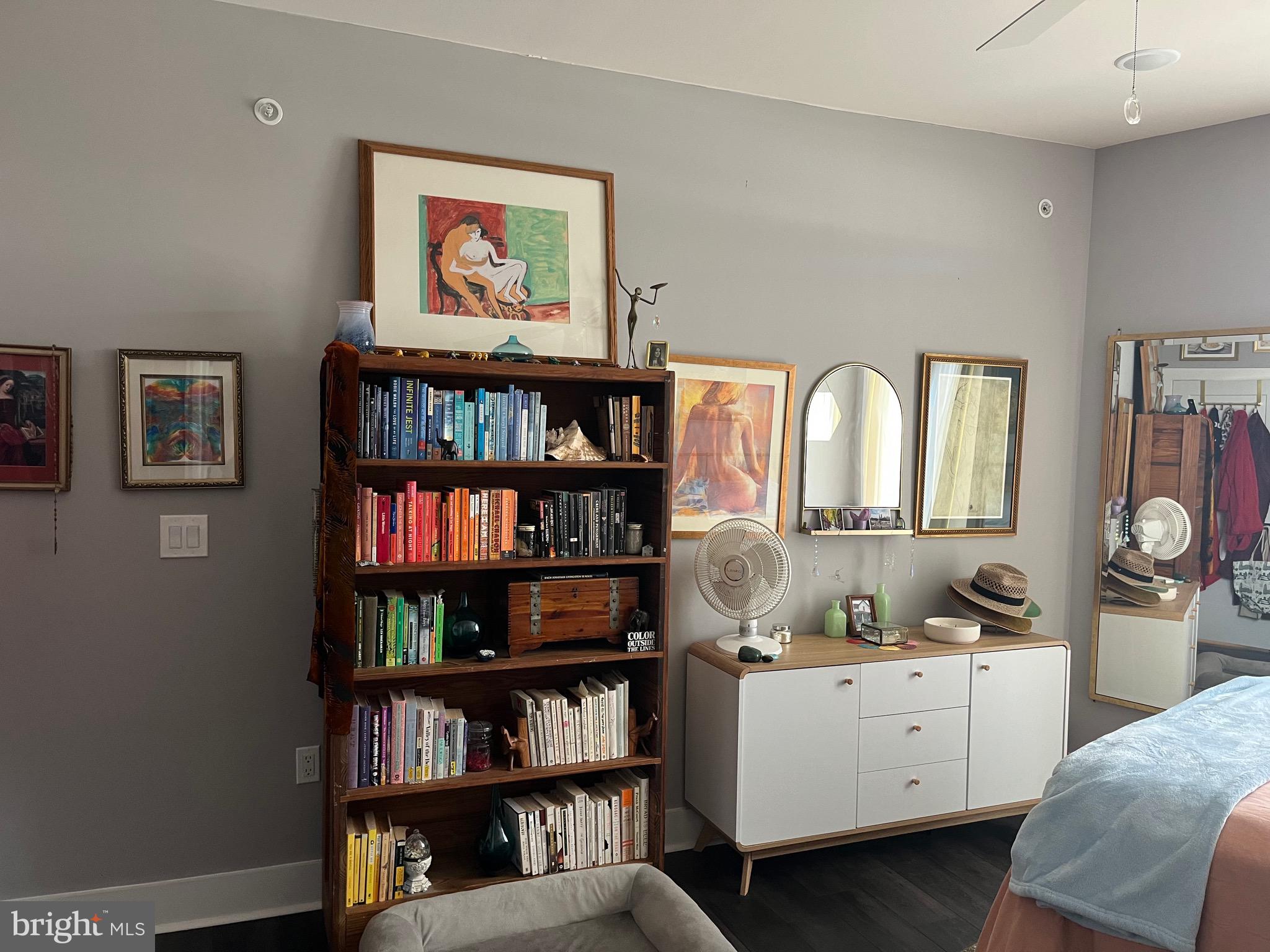 4001 Ridge Avenue Philadelphia, PA 19129 - Photo 17 of 26 a room with a book shelf and a painting on the wall