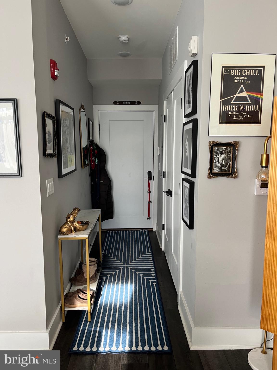 4001 Ridge Avenue Philadelphia, PA 19129 - Photo 18 of 26 a view of a hallway with paintings on the wall