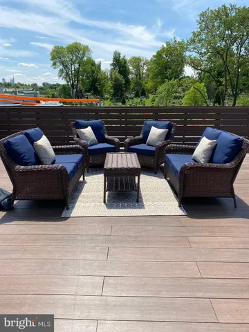 a view of sitting area with furniture and outdoor space